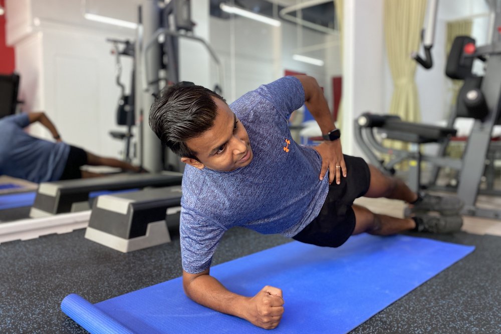 Patient performing a full-body stretch