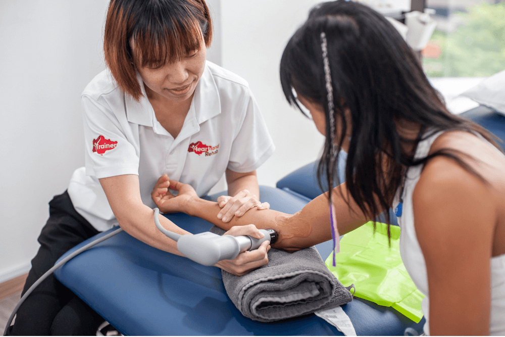 Physiotherapist conducting ultrasound therapy